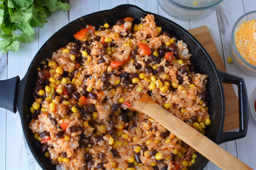 This easy enchilada skillet dinner is one of my family's go-to weeknight dinners. This easy, weeknight, one skillet meatless meal can be made with ingreidents you probably have on hand|Ripped Jeans and Bifocals