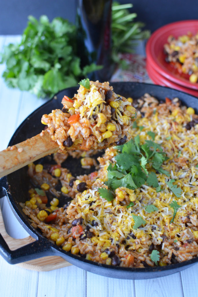 This easy enchilada skillet dinner is one of my family's go-to weeknight dinners. This easy, weeknight, one skillet meatless meal can be made with ingreidents you probably have on hand|Ripped Jeans and Bifocals