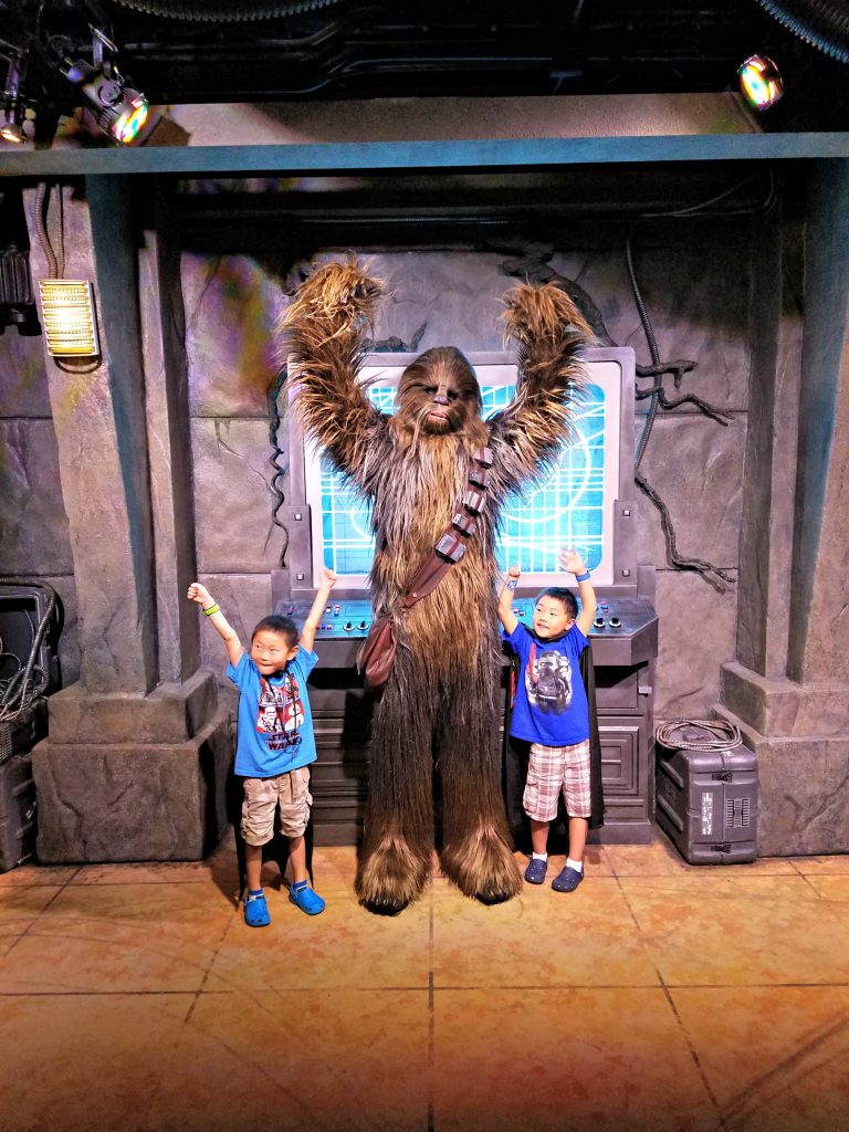 Disney World Star Wars News 2019: Galaxy's Edge and New Hotel|Two Chinese boys with Chewbacca