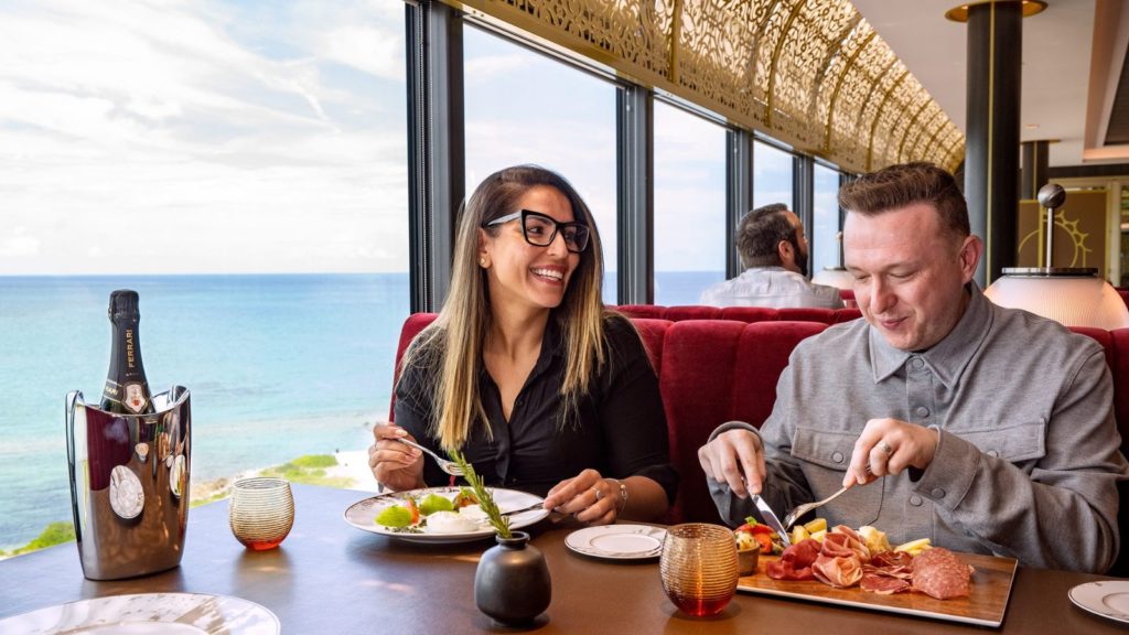 Couple eating at Palo Steakhouse.