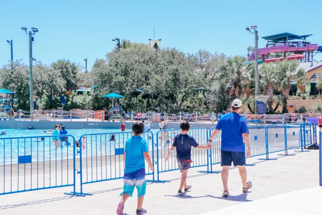 Dad and two boys at Aquatica San Antonio