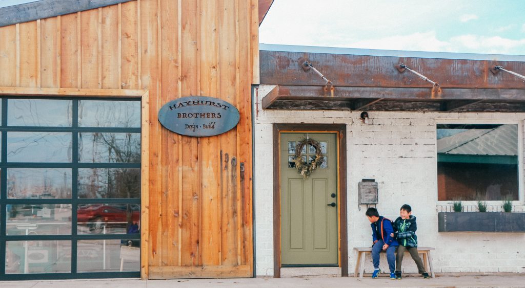 Best places to take Instagram Photos in Decatur Texas|Bridgeport Texas two boys outside the Hayhurst Brothers store