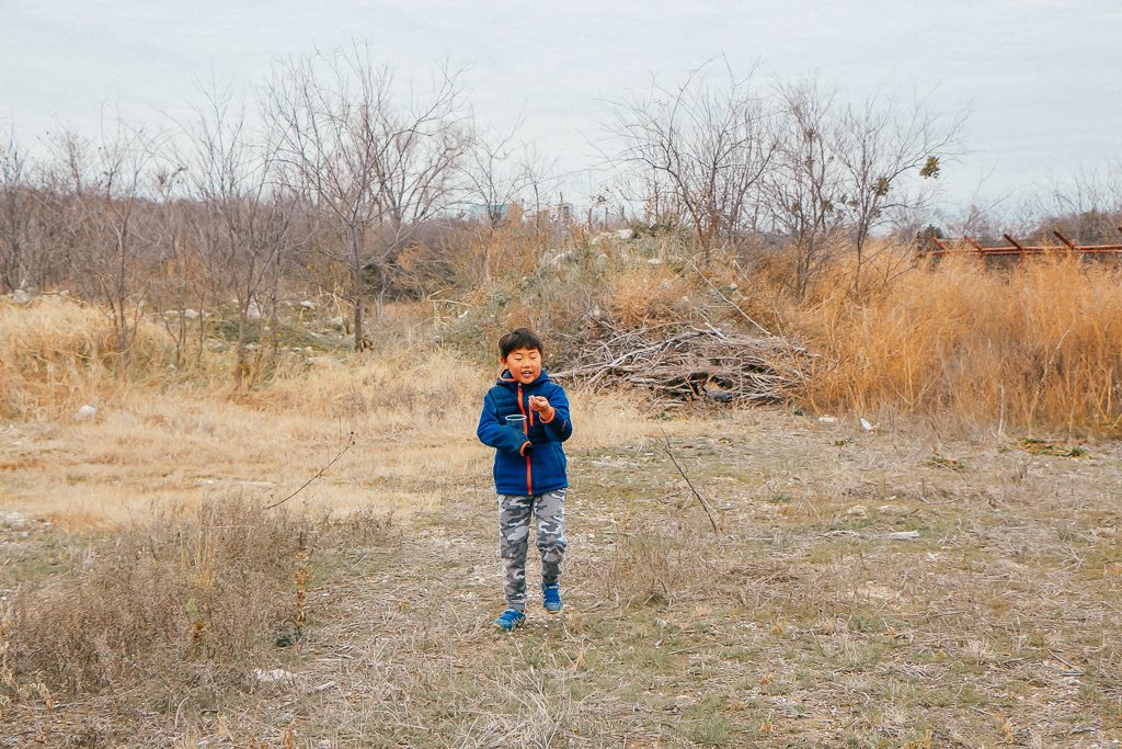 Best places to take Instagram Photos in Decatur Texas|DIY Studio Decatur, little boy with a cup of glass