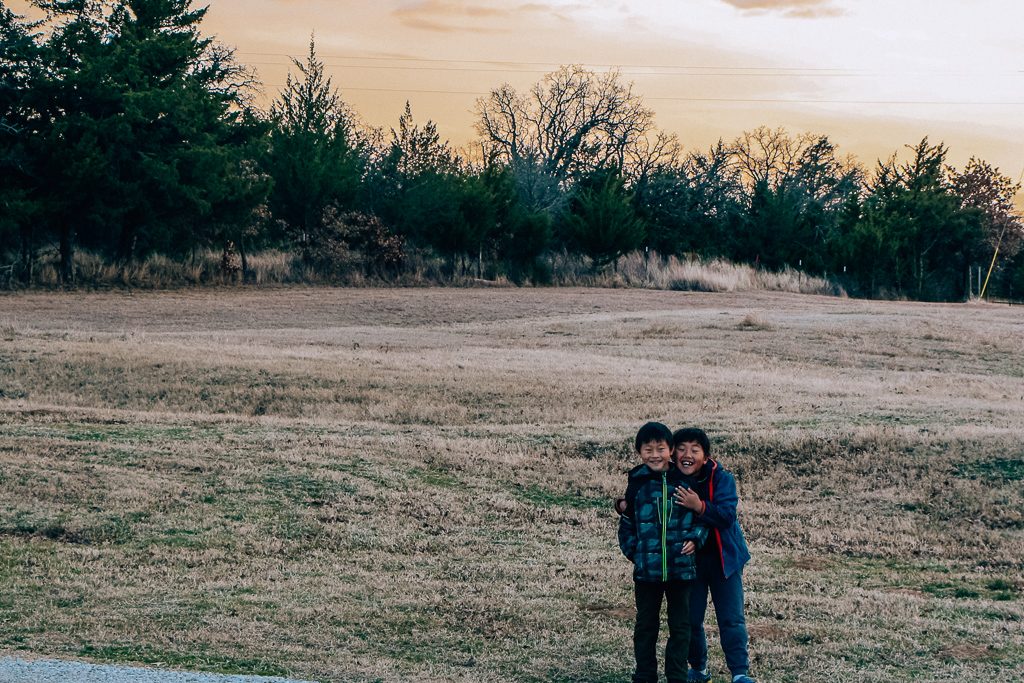 Best places to take Instagram Photos in Decatur Texas|Two boys in a field at Marker Cellars