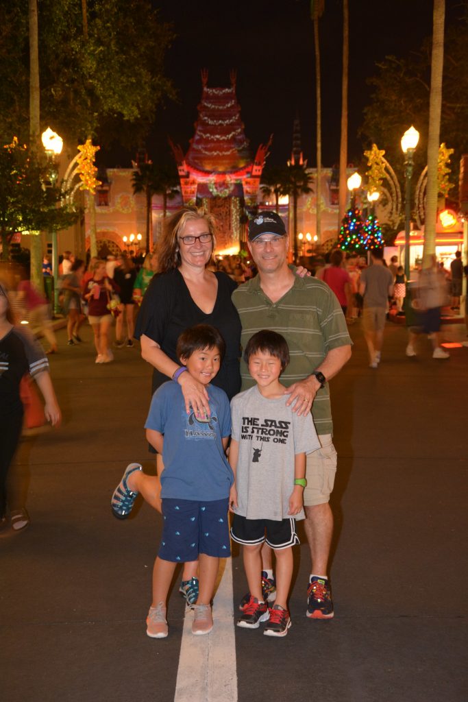 Open to close touring plan for Disney's Hollywood Studios|family of four at Disney's Hollywood studios at night