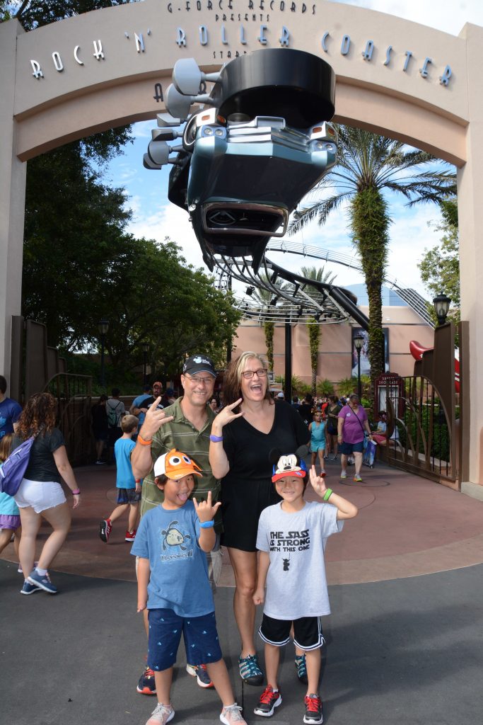 Open to close touring plan for Disney's Hollywood Studios|Family in front of the G Force Records sign at Disney's Hollywood Studios