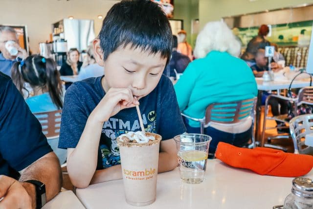 Where to eat breakfast in Tempe|Asian boy drinking a protein shake