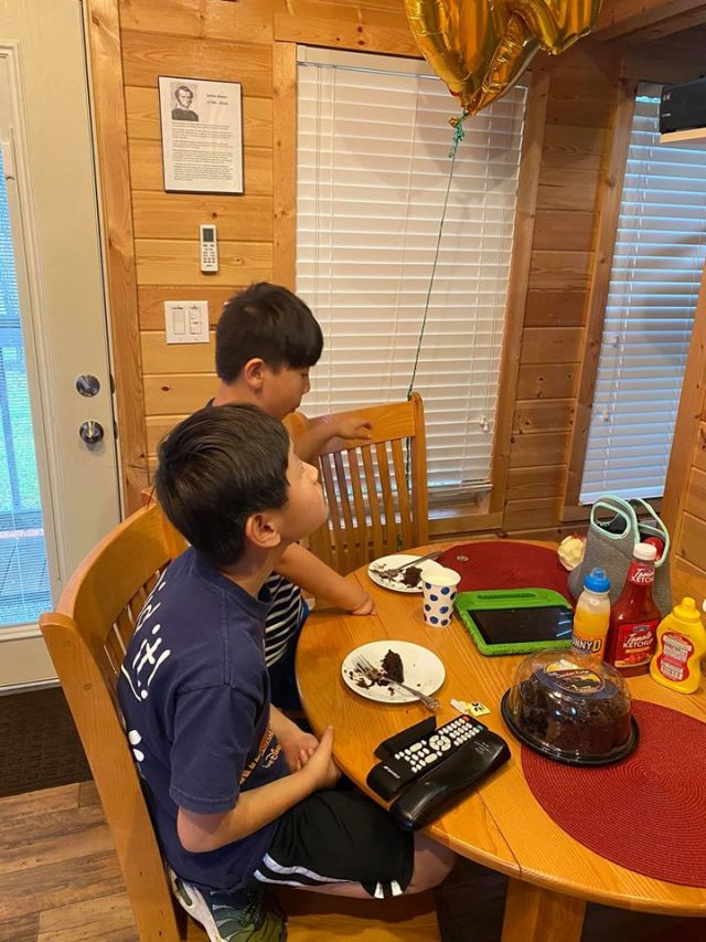 Two boys watching TV