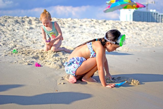 Kids playing on Alabama Beaches