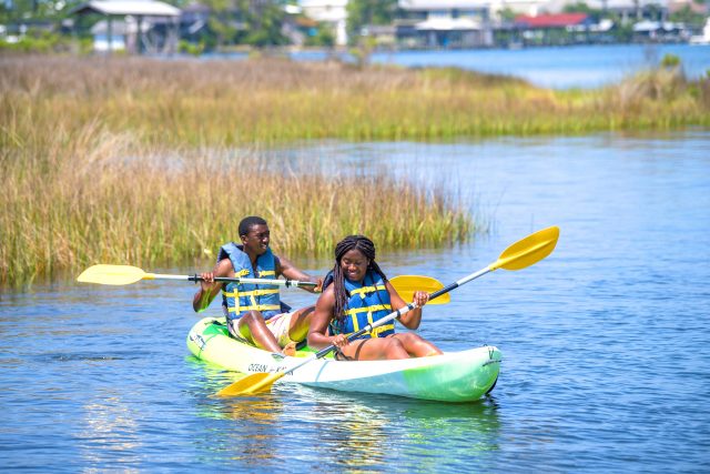 Couple kayaking in Gulf Shores Alabama