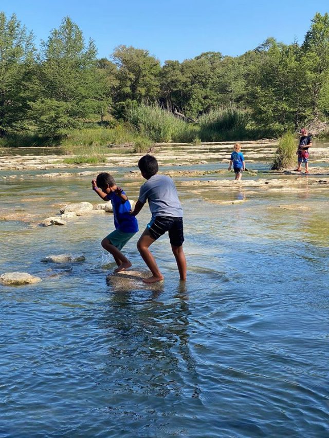 Guadalupe River two boys playing