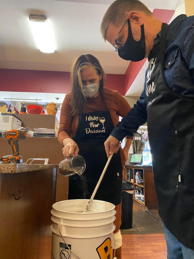 Couple making wine