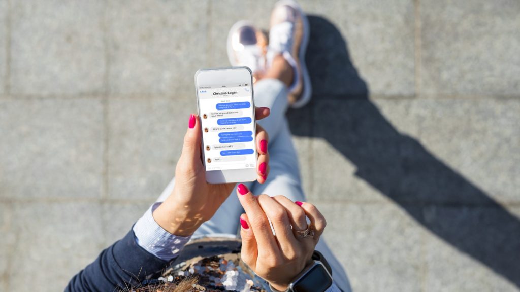 Woman texting a friend.