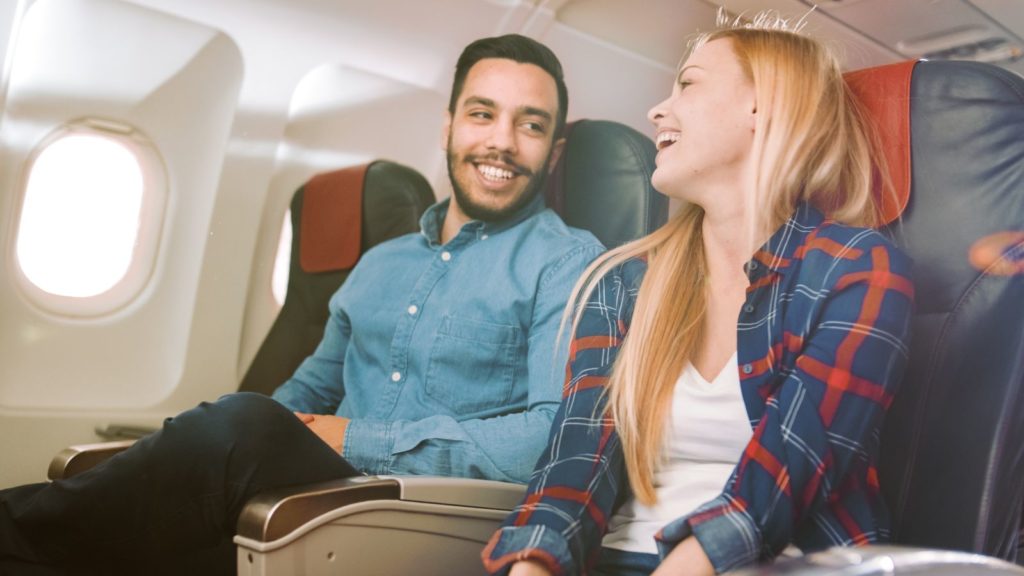 Man and woman on a plane.