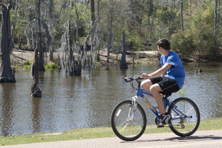 boy on bike at Sam Houston Jones state park