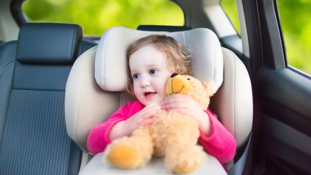 Baby in a car seat.