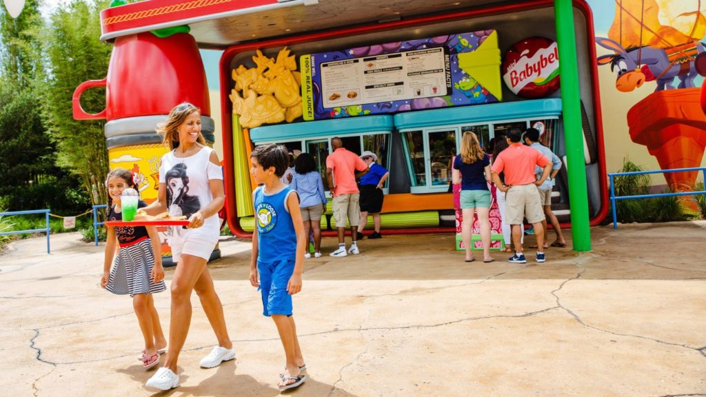 Family eating at Woody's Lunchbox Disney World.