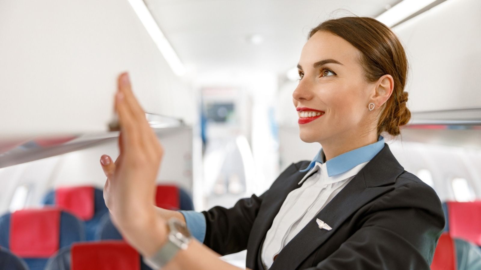 Smiling flight attendant.