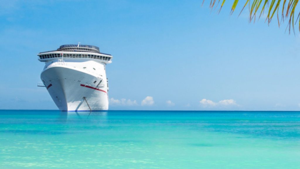 Cruise ship on turquoise water.