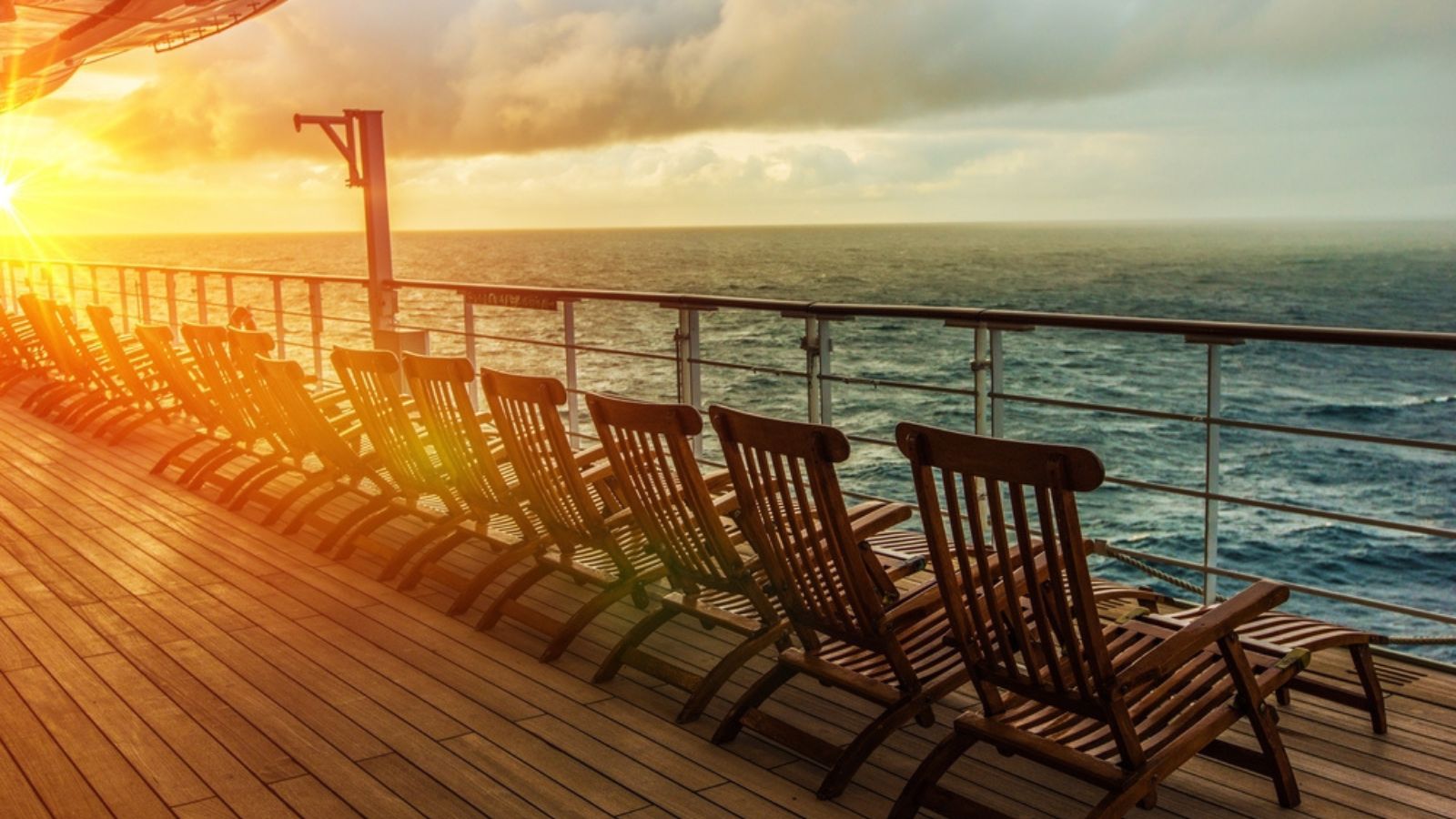 Cruise ship deck view at sunset.