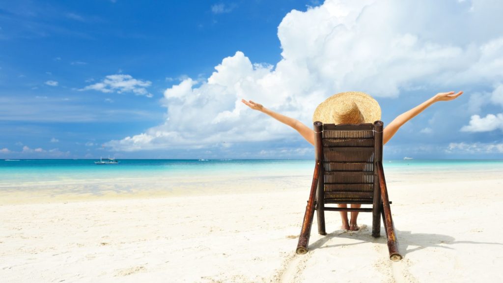 Woman in Beach Chair on Vacation.